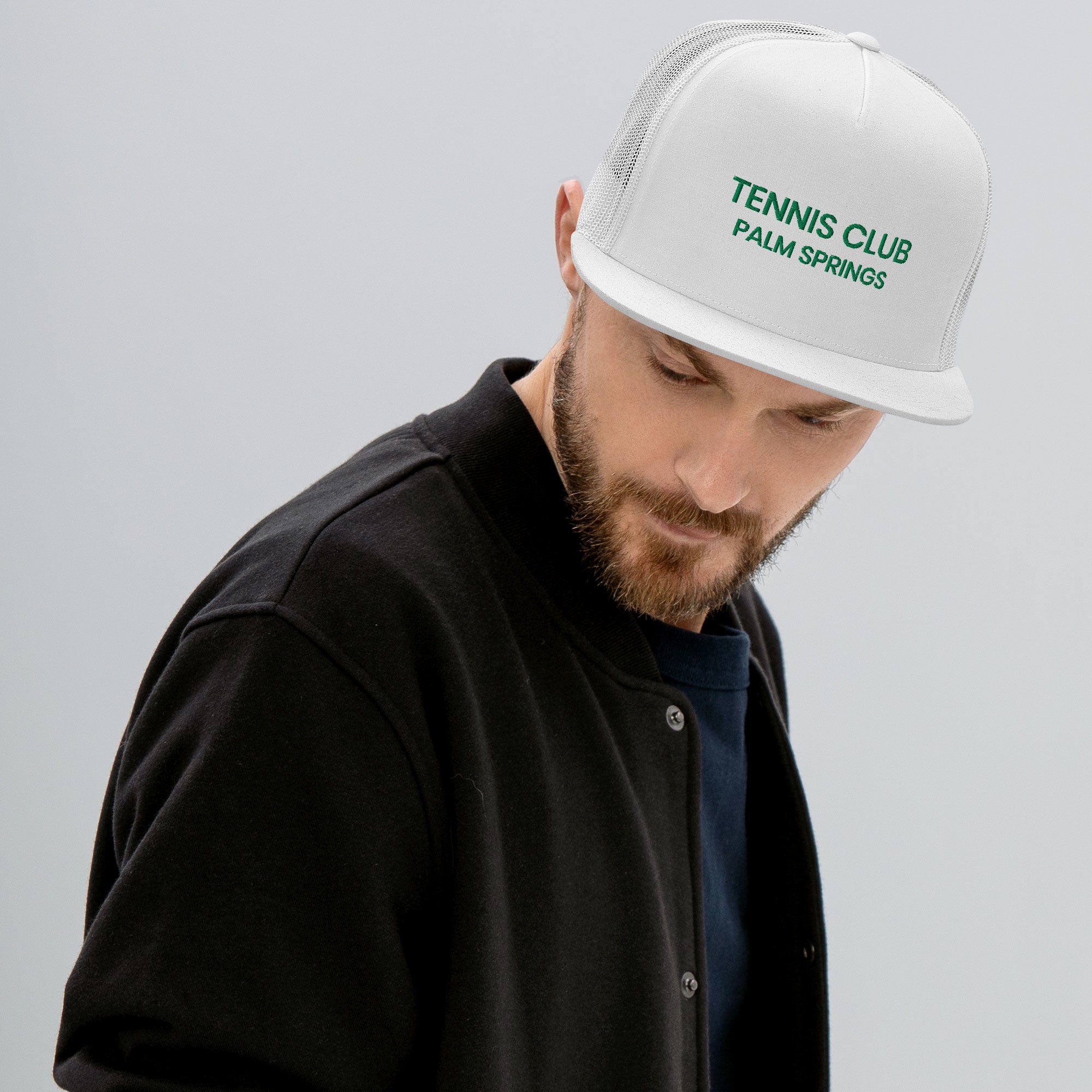 Tennis Club Mod Hat white with green text on man