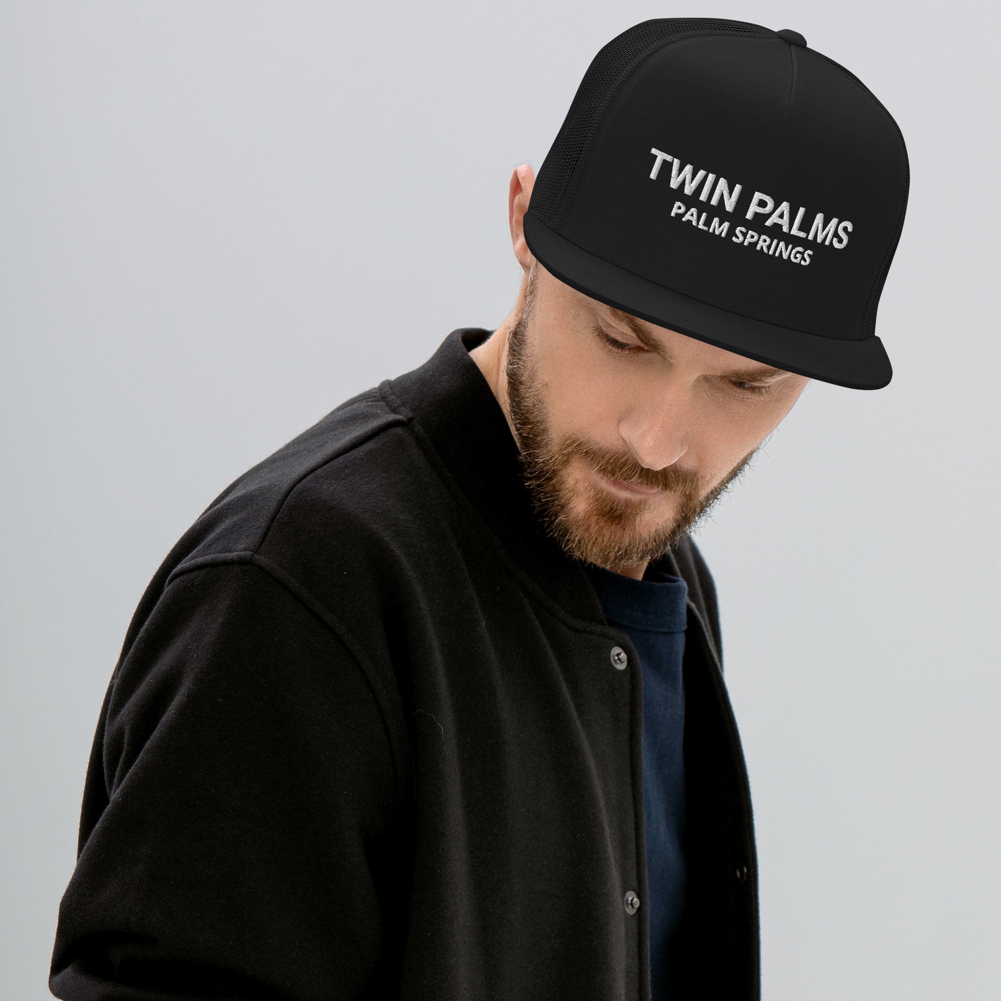 Twin Palms Mod Hat black with white text on man